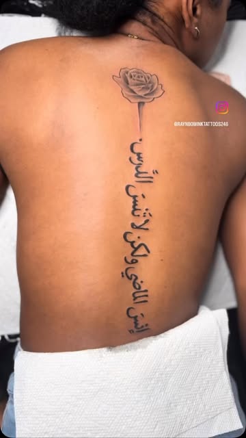 Rose and script spine tattoo by Bamz