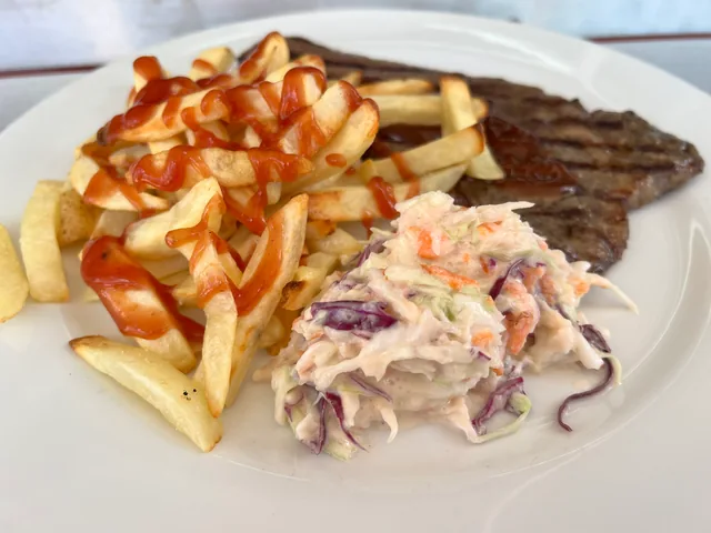 Steak, fries and salad pictured for Blazin