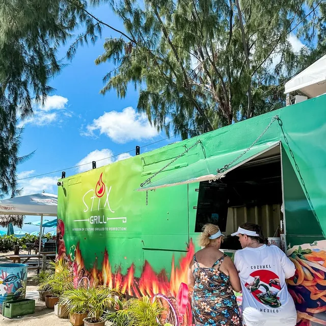 The green Stix Grill food truck